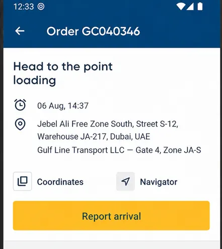 Driver app: order screen with the loading address, coordinates, navigator and a report arrival button